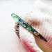 Green hair stick with mother of pearl