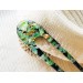 Hair fork with green seashells and wood