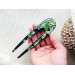 Hair fork with green seashells and wood