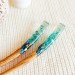 Hair stick with blue flowers