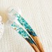 Hair stick with blue flowers