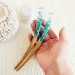 Hair stick with blue flowers